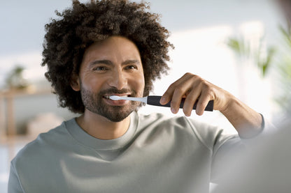 Philips Sonicare 4100 Power Toothbrush, Rechargeable Electric Toothbrush with Pressure Sensor, Black HX3681/24